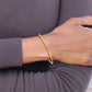 14K Yellow Gold Polished And Textured Twisted Slip-On Bangle