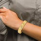 14K Yellow Gold Polished And Textured Hinged Bangle