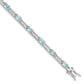 7 Inch Sterling Silver Rhodium-Plated Blue Topaz Bracelet