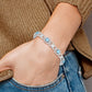 7 Inch Sterling Silver Rhodium-Plated Diamond & Light Swiss Blue Topaz Bracelet