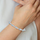 7 Inch Sterling Silver Rhodium-Plated Blue Topaz Bracelet