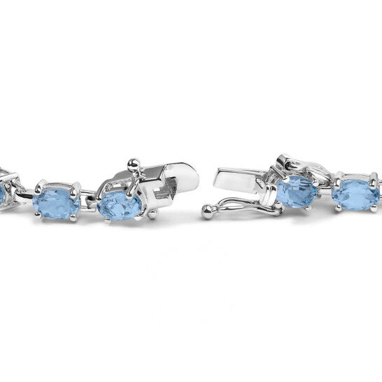 Original Haus of Brilliance .925 Sterling Silver 11.0 Cttw Oval Shaped Created Light Blue Topaz Link Bracelet - 7 inch