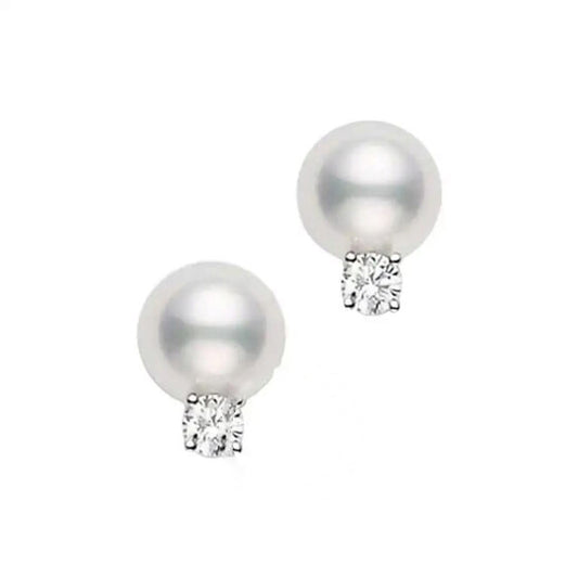 Original Mikimoto Akoya cultured pearl stud earrings; 7.5 x 8mm; with 0.10ct diamonds; set in 18K white gold.  PES752DW