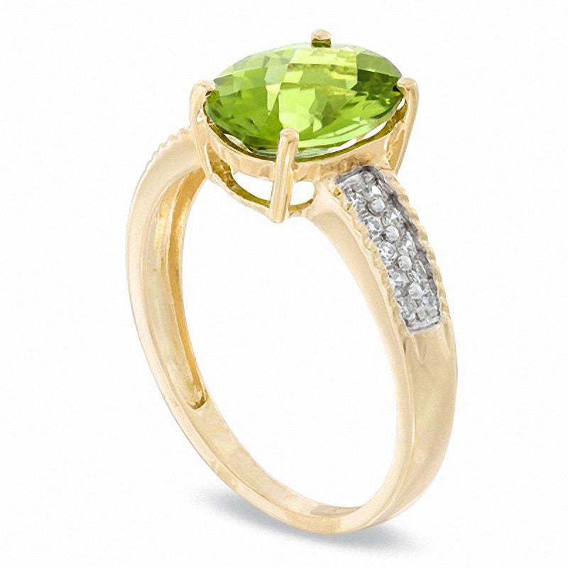 Oval Peridot and 0.10 CT. T.W. Natural Diamond Ring in Solid 14K Gold