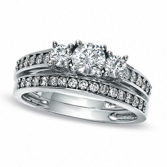 0.88 CT. T.W. Natural Diamond Three Stone Bridal Engagement Ring Set in Solid 10K White Gold