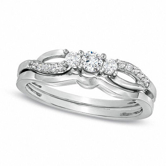 0.25 CT. T.W. Natural Diamond Three Stone Split Shank Bridal Engagement Ring Set in Sterling Silver