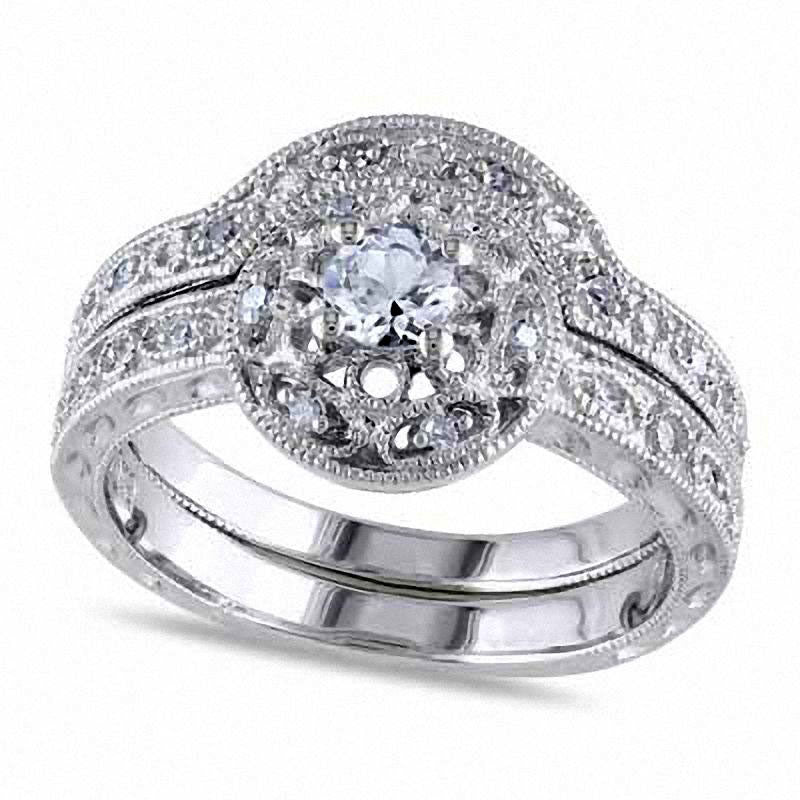 Lab-Created White Sapphire and 0.10 CT. T.W. Diamond Bridal Engagement Ring Set in Sterling Silver