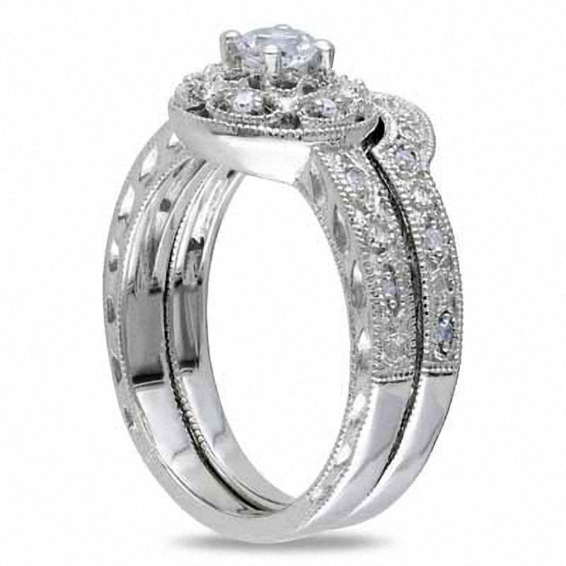 Lab-Created White Sapphire and 0.10 CT. T.W. Diamond Bridal Engagement Ring Set in Sterling Silver