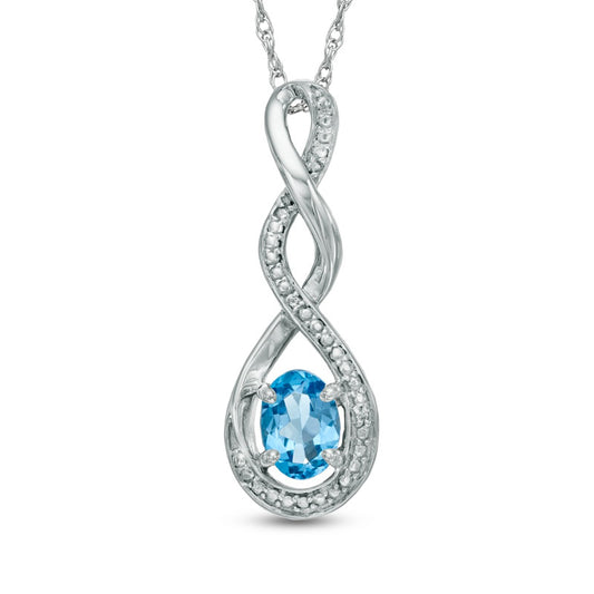 Oval Blue Topaz and Natural Diamond Accent Infinity Twist Pendant in Sterling Silver