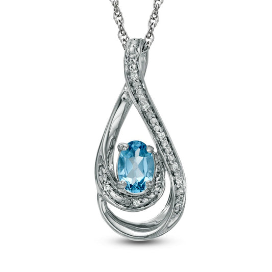 Oval Blue Topaz and Natural Diamond Accent Loop Pendant in Sterling Silver