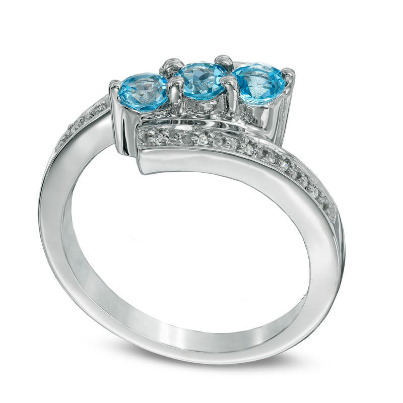 Blue Topaz and Natural Diamond Accent Three Stone Bypass Ring in Sterling Silver