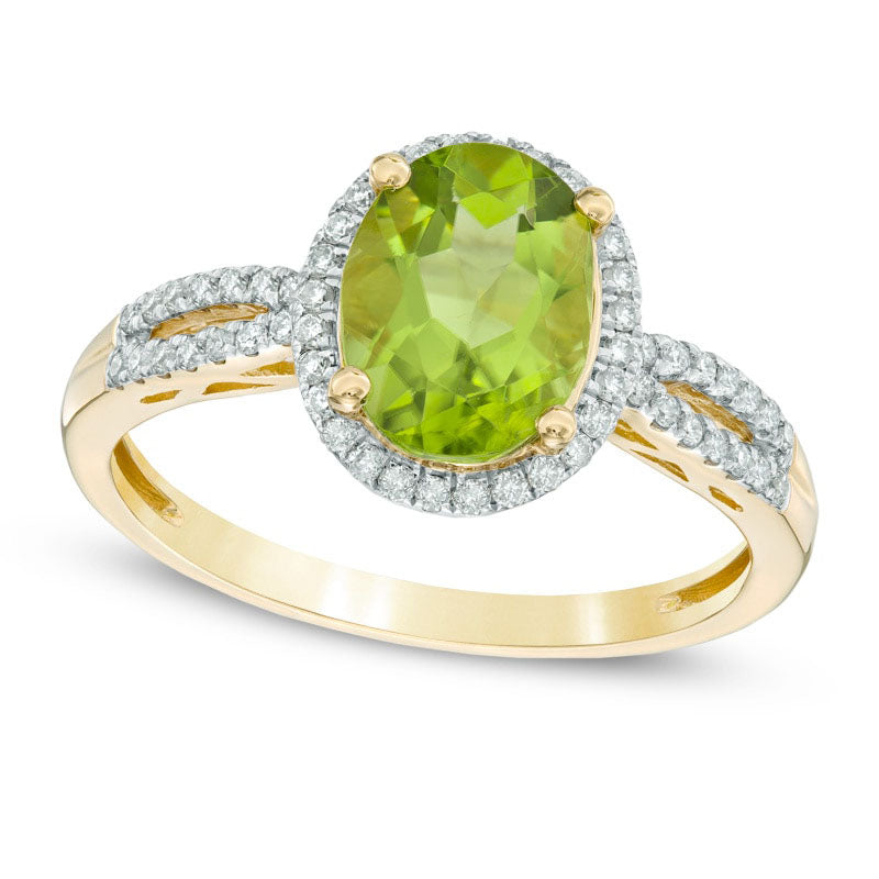 Oval Peridot and 0.20 CT. T.W. Natural Diamond Frame Ring in Solid 10K Yellow Gold