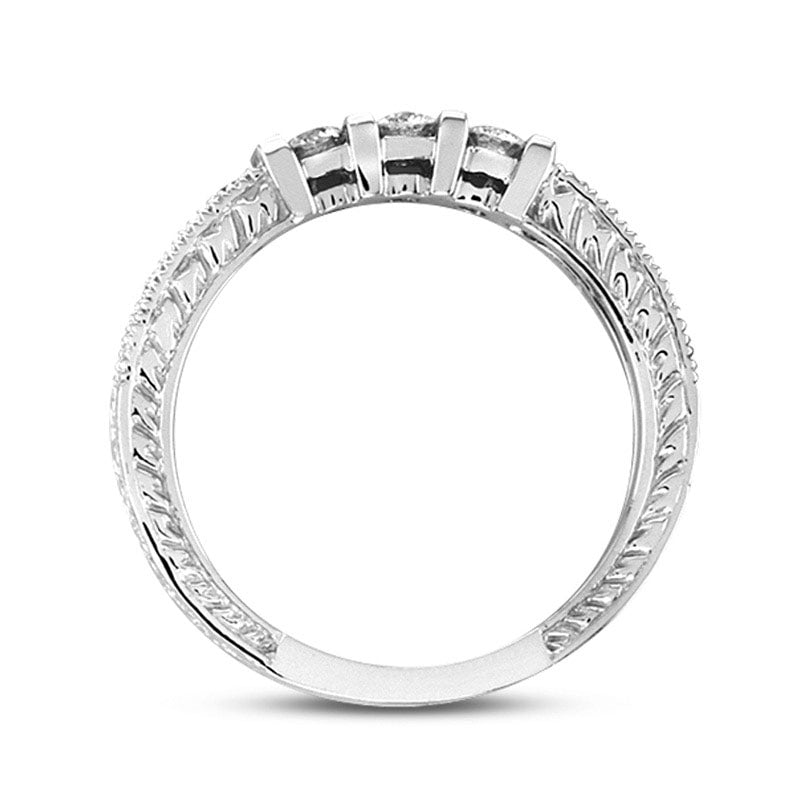 0.33 CT. T.W. Natural Diamond Three Stone Wedding Band in Solid 14K White Gold (I/SI2)