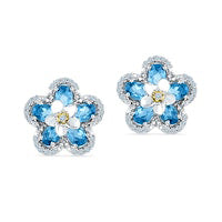 Oval Blue Topaz and 0.2 CT. T.W. Diamond Flower Stud Earrings in Sterling Silver and 10K Gold