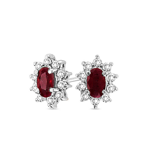 Oval Ruby and 0.33 CT. T.W. Diamond Sunburst Frame Stud Earrings in 14K White Gold