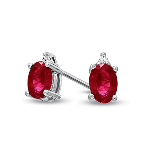 Oval Ruby and Diamond Accent Stud Earrings in 14K White Gold