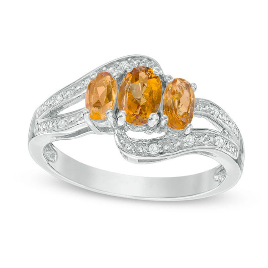 Oval Citrine and White Topaz Three Stone Bypass Ring in Sterling Silver