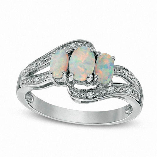 Oval Lab-Created Opal and White Sapphire Three Stone Bypass Ring in Sterling Silver