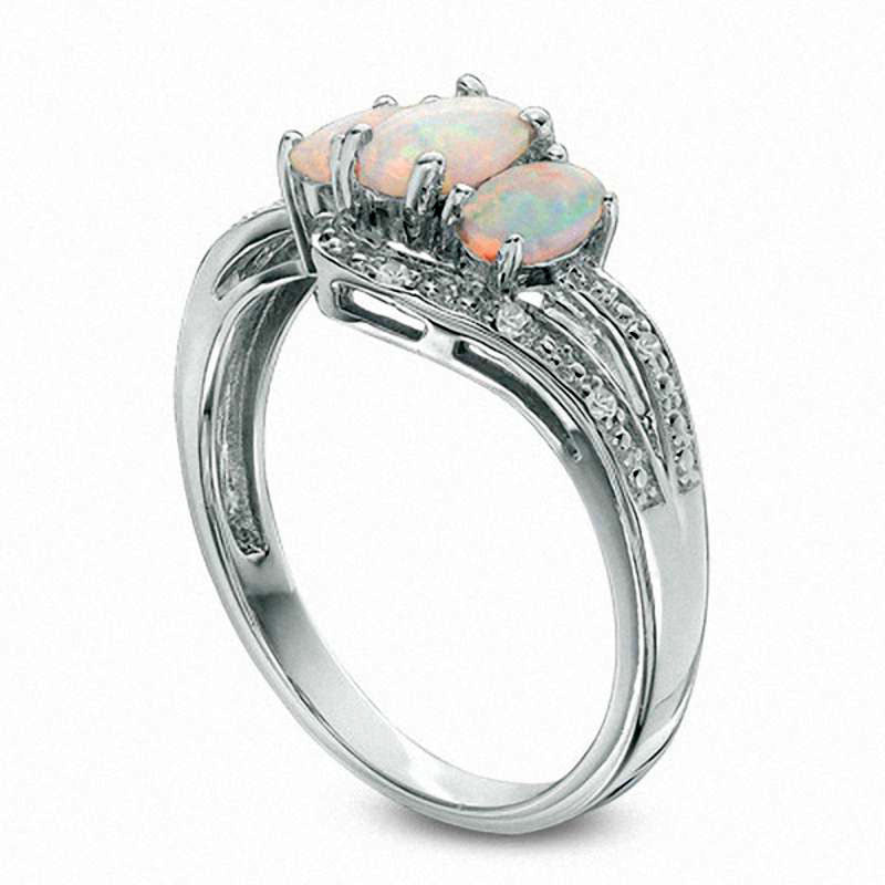 Oval Lab-Created Opal and White Sapphire Three Stone Bypass Ring in Sterling Silver