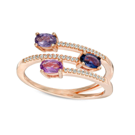 Oval Purple Sapphire and 0.10 CT. T.W. Natural Diamond Three Stone Split Shank Ring in Solid 10K Rose Gold