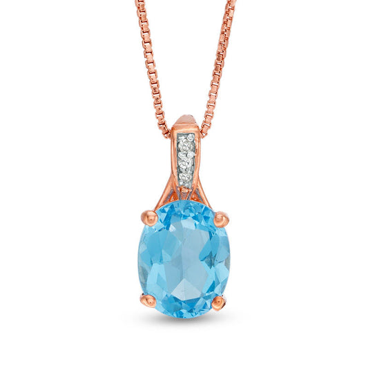 Oval Blue Topaz and Natural Diamond Accent Pendant in Sterling Silver with Rose Rhodium