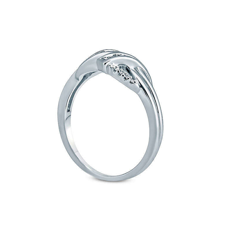 0.13 CT. T.W. Baguette and Round Natural Diamond Bypass Ring in Sterling Silver