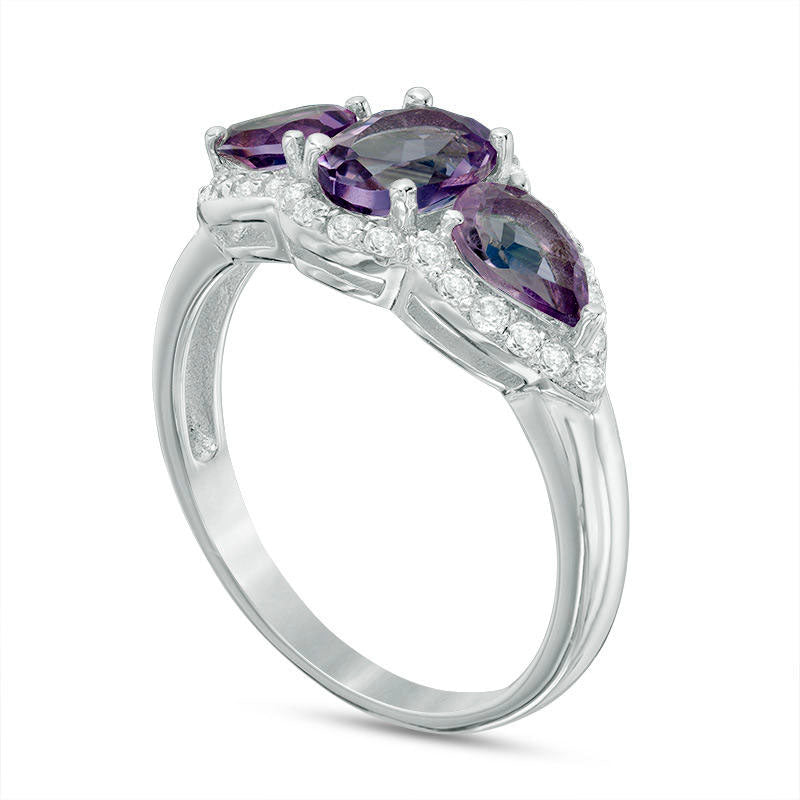 Oval and Pear-Shaped Amethyst and White Topaz Frame Three Stone Ring in Sterling Silver