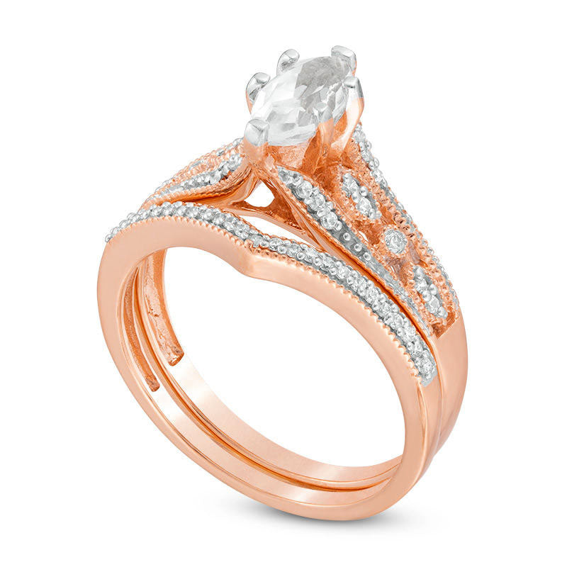 Lab-Created Marquise White Sapphire and 0.20 CT. T.W. Diamond Bridal Engagement Ring Set in Solid 10K Rose Gold