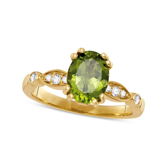 Oval Peridot and 0.10 CT. T.W. Natural Diamond Tri-Sides Ring in Solid 10K Yellow Gold