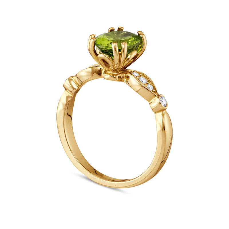 Oval Peridot and 0.10 CT. T.W. Natural Diamond Tri-Sides Ring in Solid 10K Yellow Gold