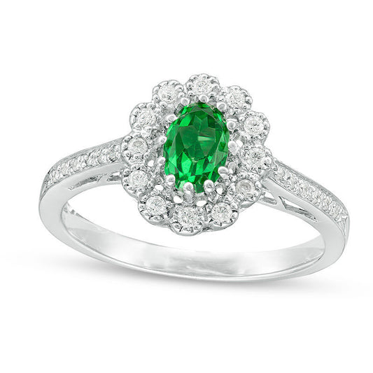 Oval Lab-Created Emerald and 0.17 CT. T.W. Diamond Flower Frame Engagement Ring in Sterling Silver