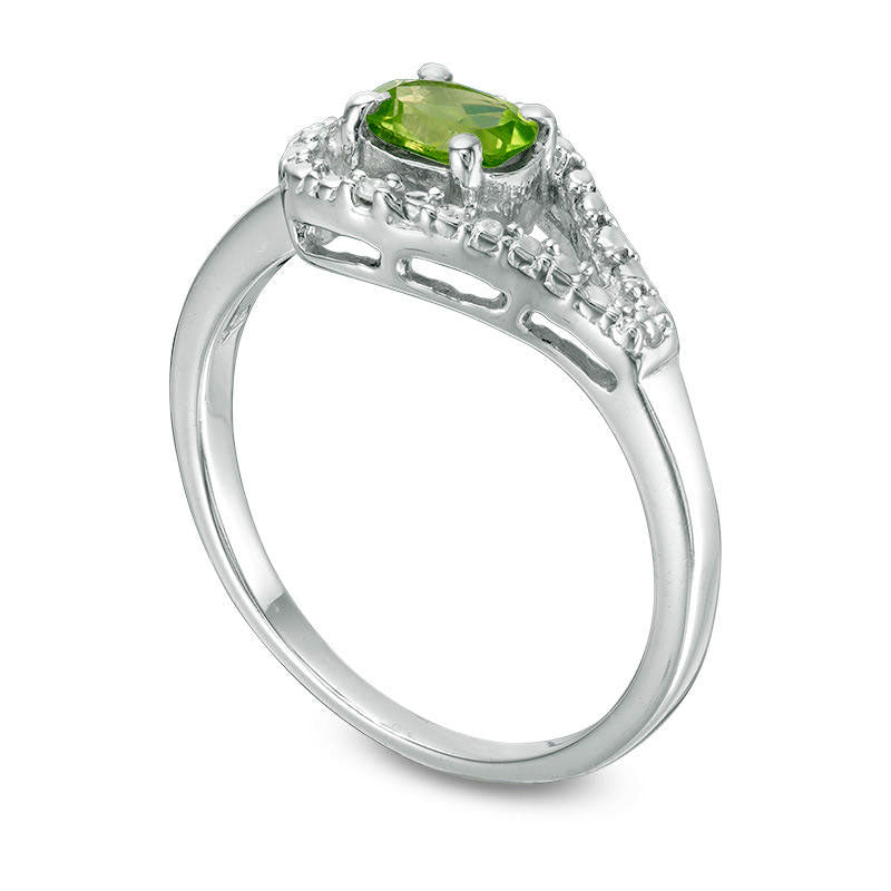 Oval Peridot and Natural Diamond Accent Teardrop Frame Ring in Sterling Silver