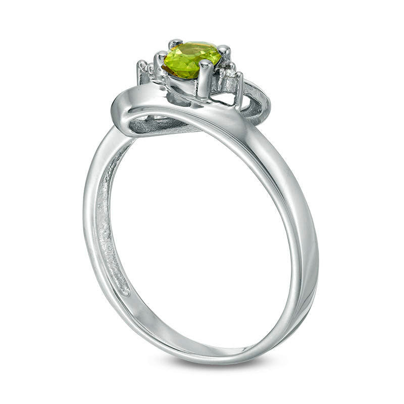 Oval Peridot and Natural Diamond Accent Bypass Ring in Sterling Silver