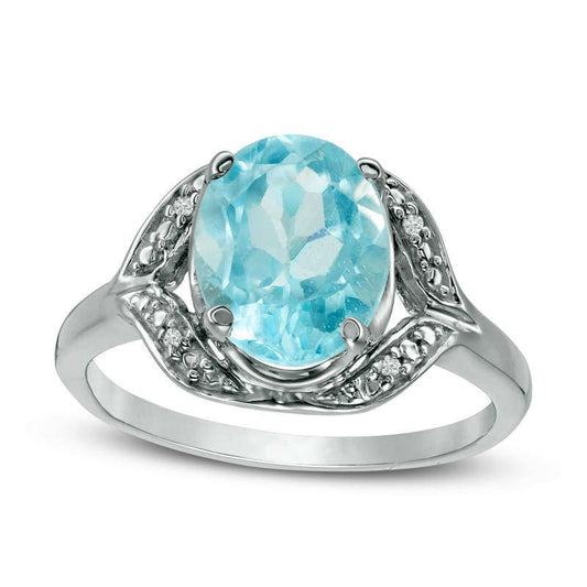 Oval Blue Topaz and Natural Diamond Accent Ring in Sterling Silver