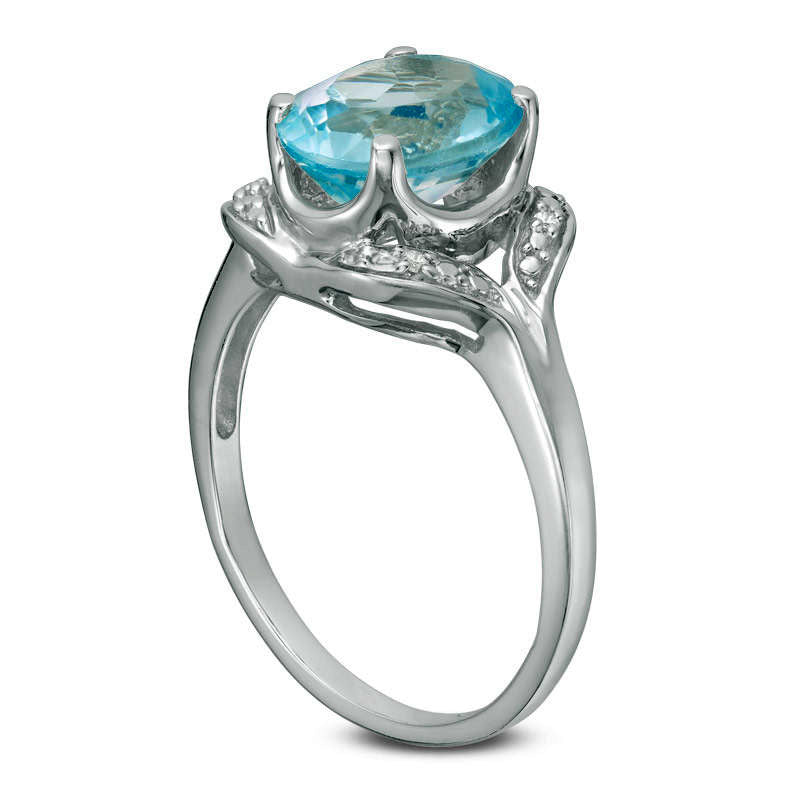 Oval Blue Topaz and Natural Diamond Accent Ring in Sterling Silver