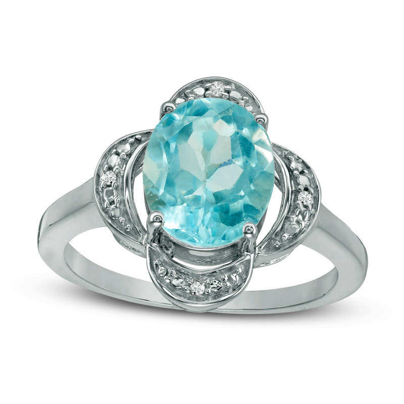 Oval Blue Topaz and Natural Diamond Accent Clover Frame Ring in Sterling Silver