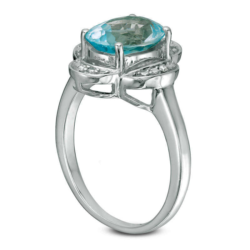 Oval Blue Topaz and Natural Diamond Accent Clover Frame Ring in Sterling Silver