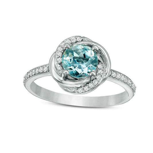 6.0mm Sky Blue Topaz and 0.17 CT. T.W. Natural Diamond Orbit Frame Ring in Solid 10K White Gold