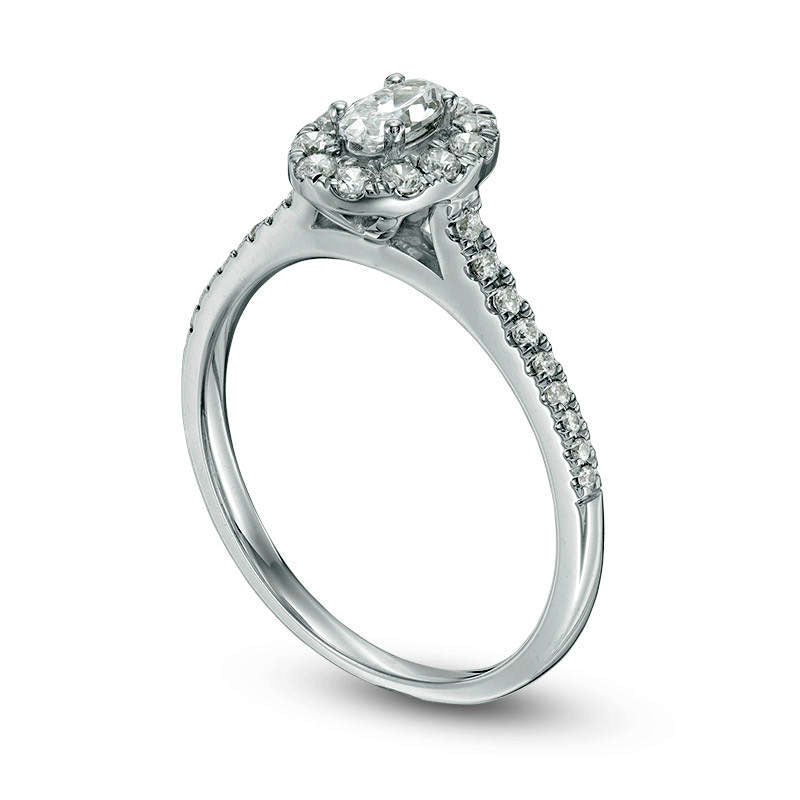 0.63 CT. T.W. Oval Natural Diamond Frame Engagement Ring in Solid 14K White Gold