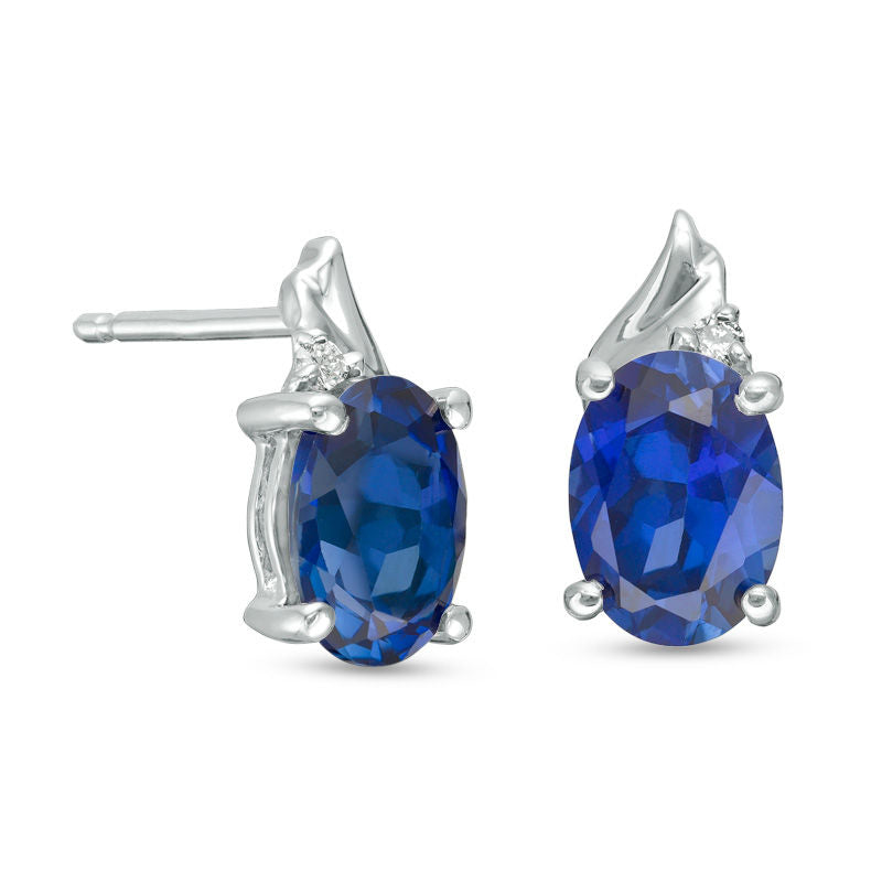 Oval Lab-Created Blue Sapphire and Diamond Accent Swirl Top Drop Earrings in 10K White Gold