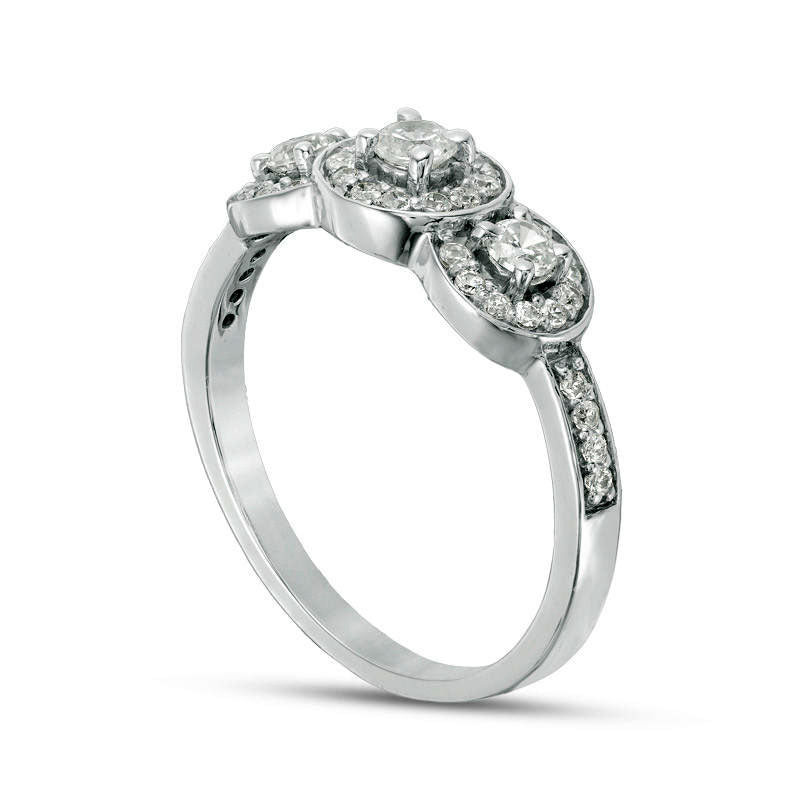 0.50 CT. T.W. Natural Diamond Three Stone Frame Engagement Ring in Solid 10K White Gold