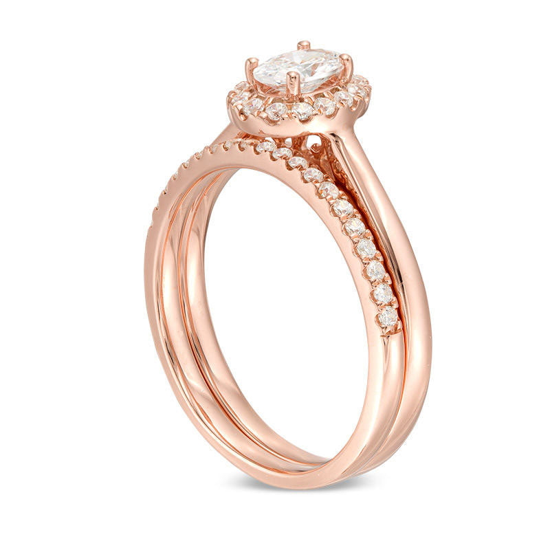 0.75 CT. T.W. Oval Natural Diamond Frame Bridal Engagement Ring Set in Solid 14K Rose Gold