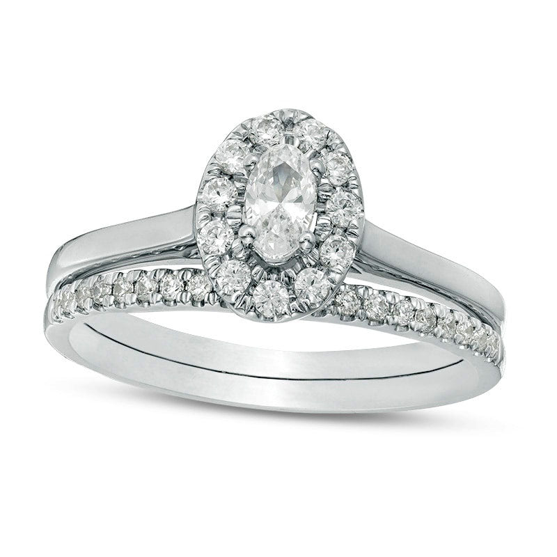 0.63 CT. T.W. Oval Natural Diamond Frame Bridal Engagement Ring Set in Solid 14K White Gold