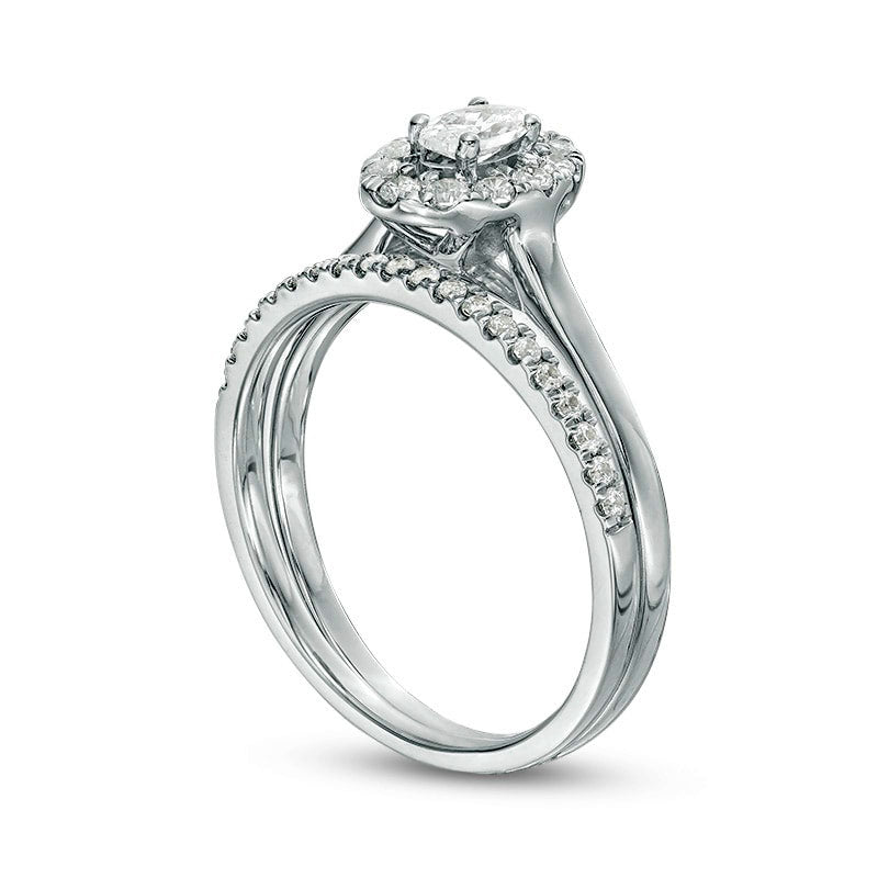 0.63 CT. T.W. Oval Natural Diamond Frame Bridal Engagement Ring Set in Solid 14K White Gold