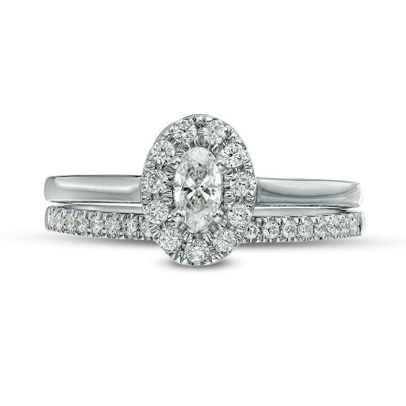 0.63 CT. T.W. Oval Natural Diamond Frame Bridal Engagement Ring Set in Solid 14K White Gold