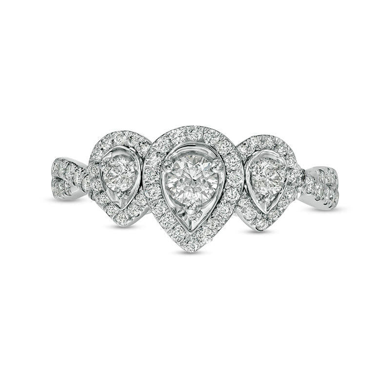 0.75 CT. T.W. Natural Diamond Three Stone Pear-Shaped Frame Twist Engagement Ring in Solid 10K White Gold