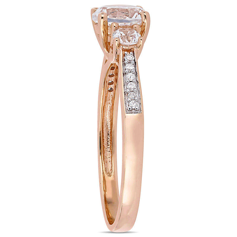 Lab-Created White Sapphire and 0.05 CT. T.W. Diamond Three Stone Engagement Ring in Solid 10K Rose Gold