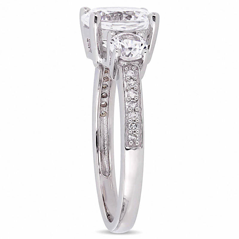 Lab-Created White Sapphire and 0.07 CT. T.W. Diamond Three Stone Engagement Ring in Solid 10K White Gold