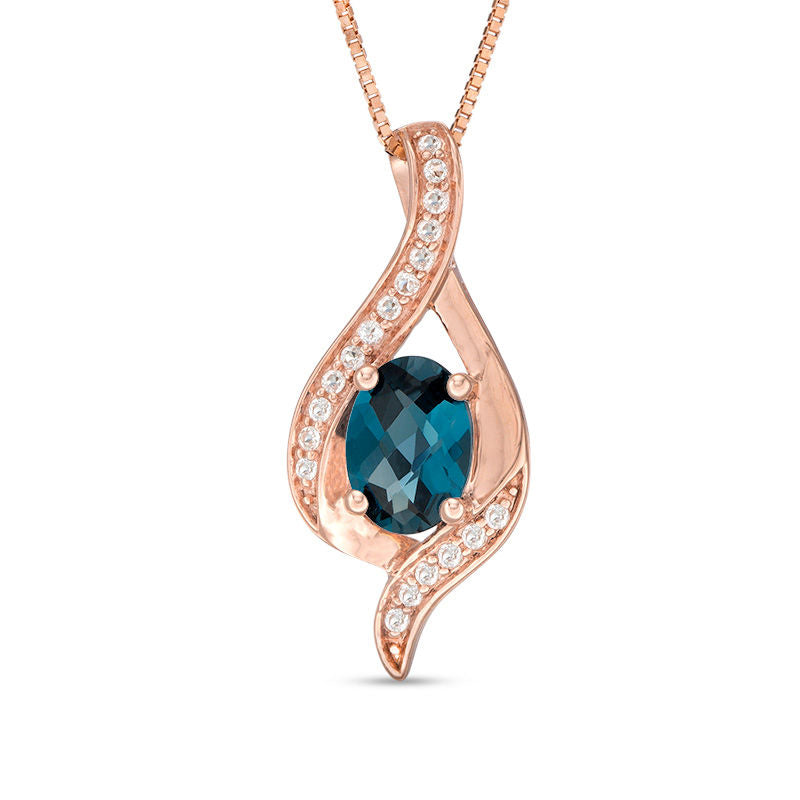 Oval London Blue and White Topaz Ribbon Flame Pendant in 10K Rose Gold