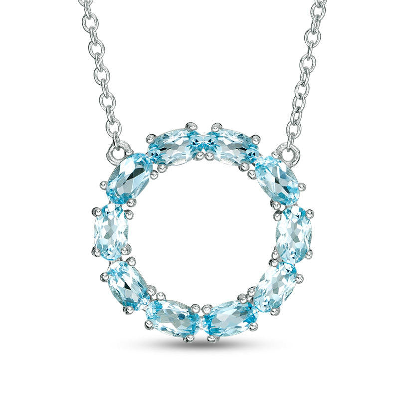 Oval Blue Topaz Circle Necklace in Sterling Silver